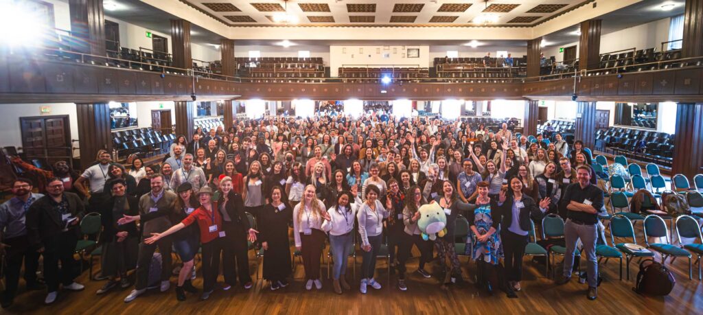 Photos of people speaking and listening at a conference.